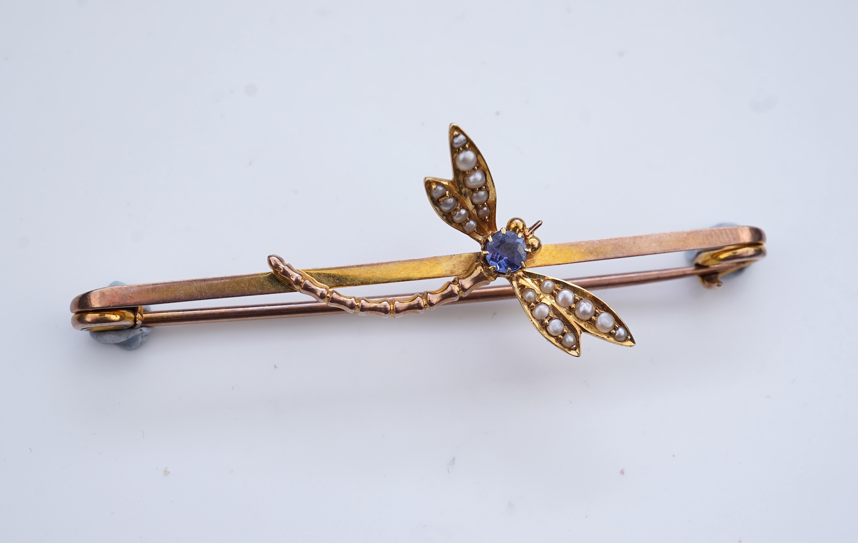 An Edwardian seed pearl and sapphire bar brooch, early 20th century